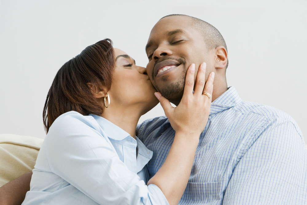 African American couple kissing